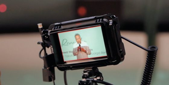 Takaful Malaysia Town Hall 2025 — professional camera and audience